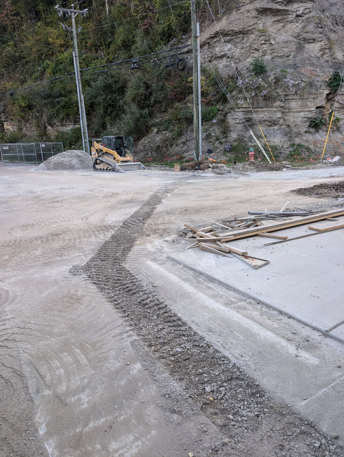 Excavation and site work — skid steer grading